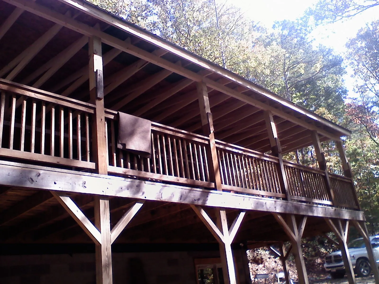 Timber framing under a new elevated porch and deck — Roof Leak Repair in Beardsley by Roofing Brothers